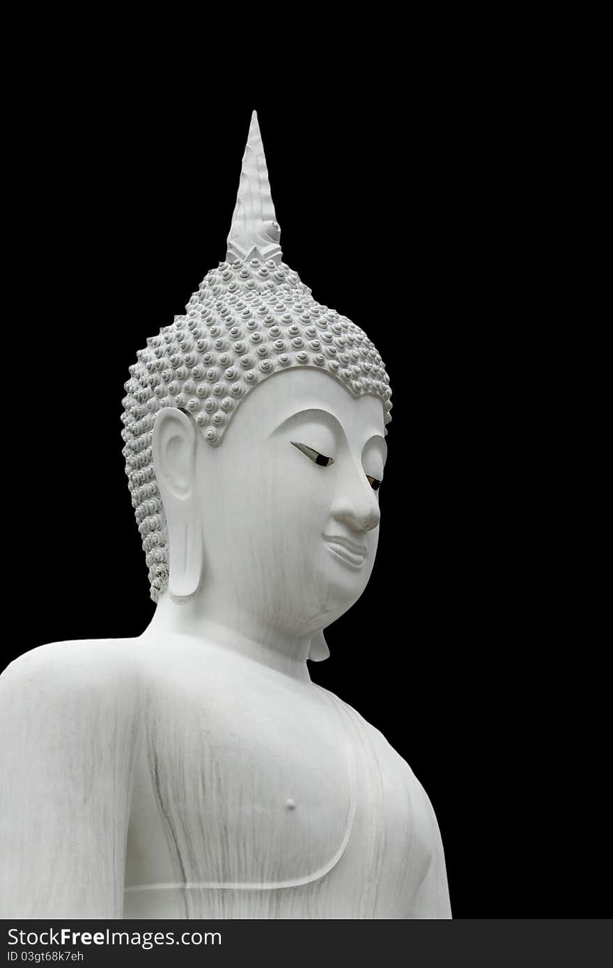 Closeup of buddha statue over black background