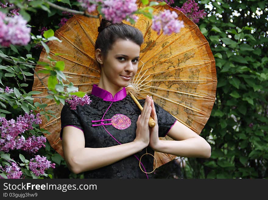 Asian style woman in lilac