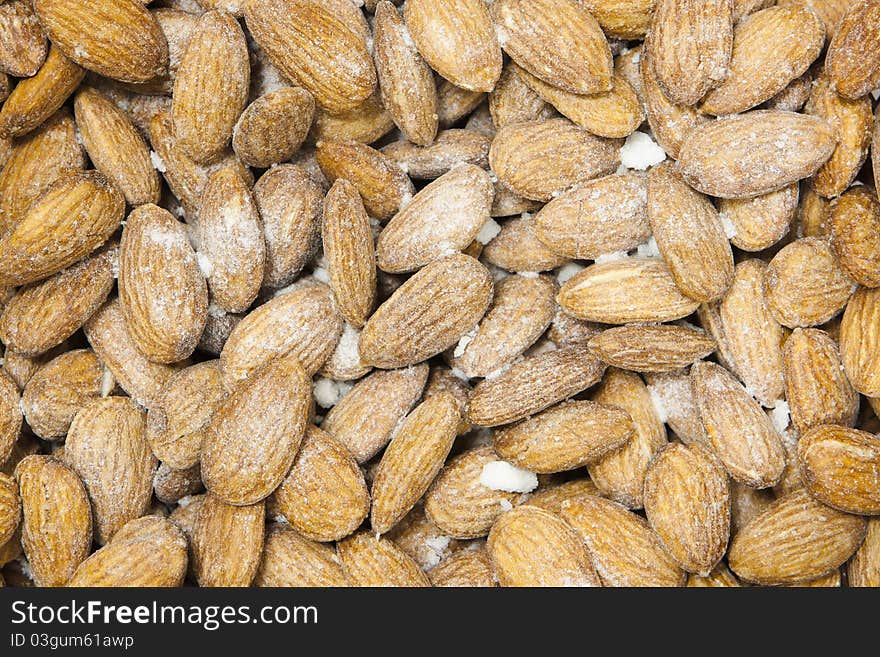 The almonds background. closeup macro almonds in sugar