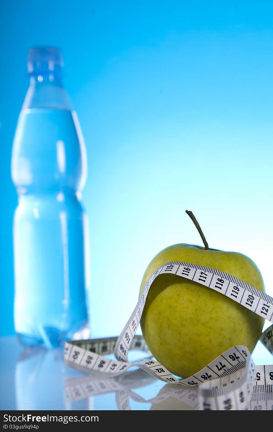 Green apple and measuring tape. Green apple and measuring tape