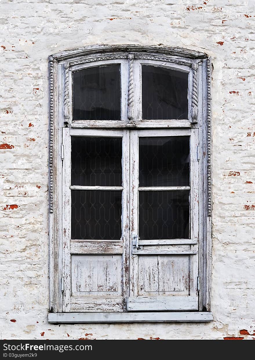 Vintage glass wooden door in church of ancient monastery. Vintage glass wooden door in church of ancient monastery