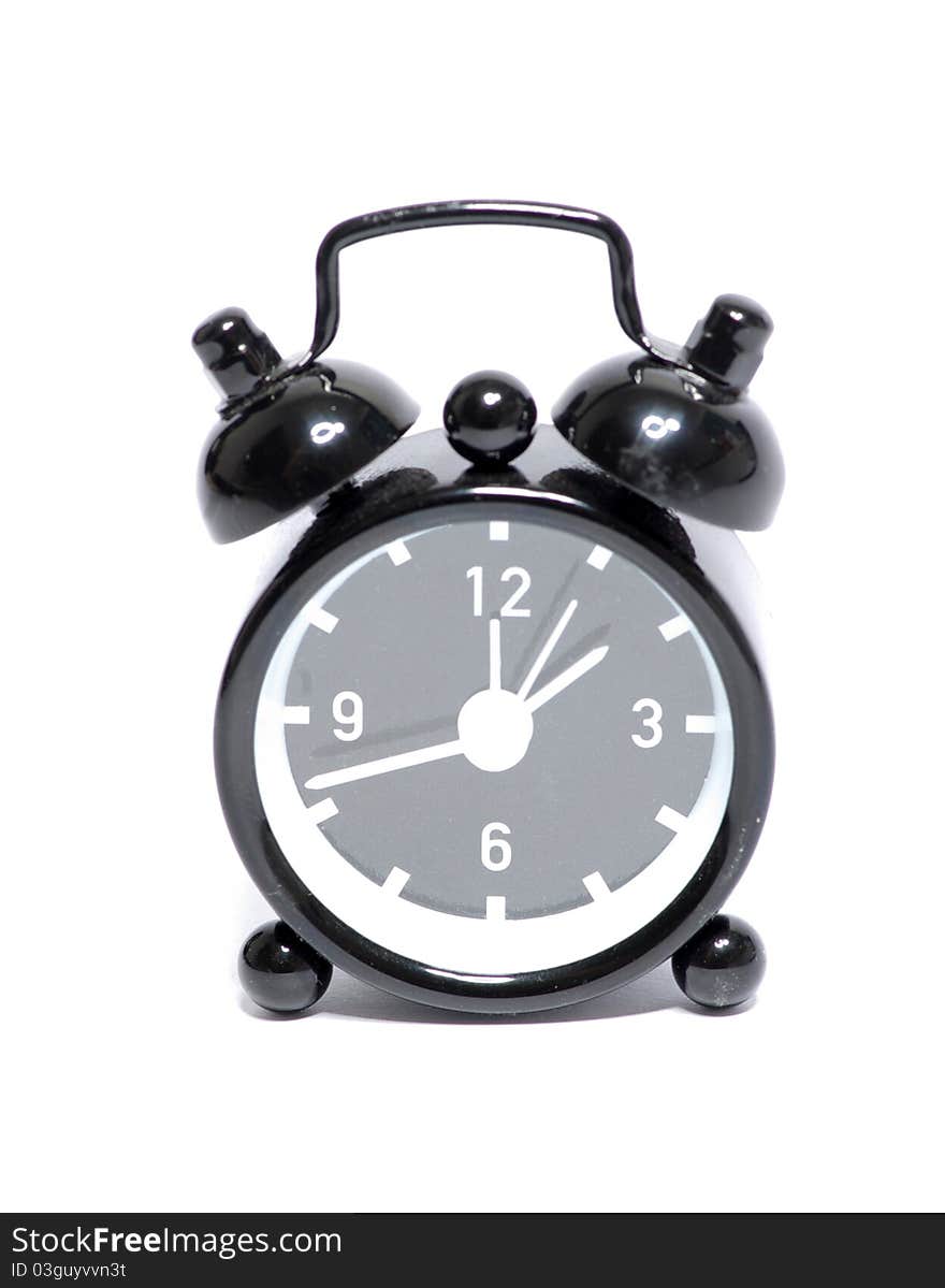 Black alarm clock isolated on white background