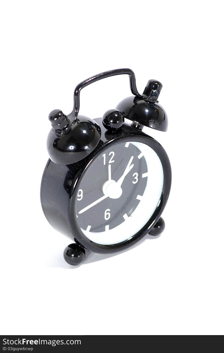 Black alarm clock isolated on white background