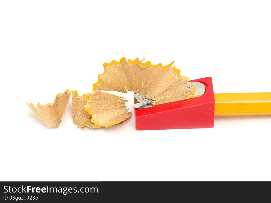 Pencil sharpener with yellow pencil isolated on white background