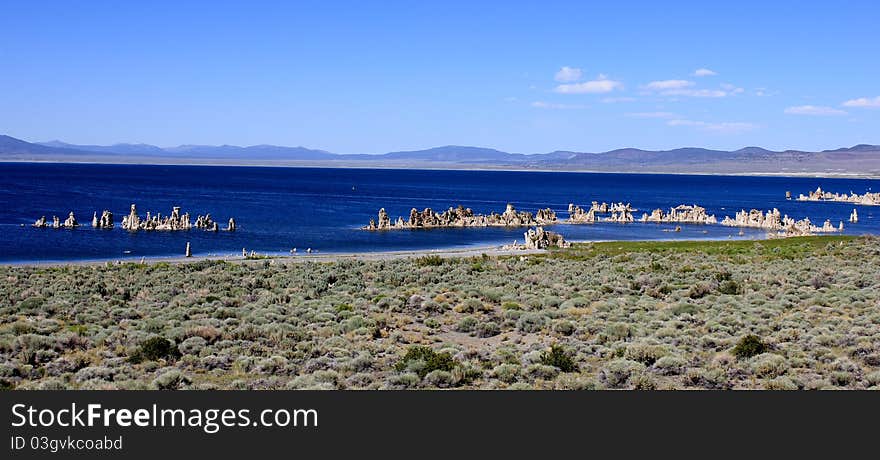 Mono Lake, California. Mono Lake is at least 760,000 years ago as a terminal lake in a basin that has no outlet to the ocean. Because it lacks an outlet, dissolved salts make the lake very alkaline and salty.