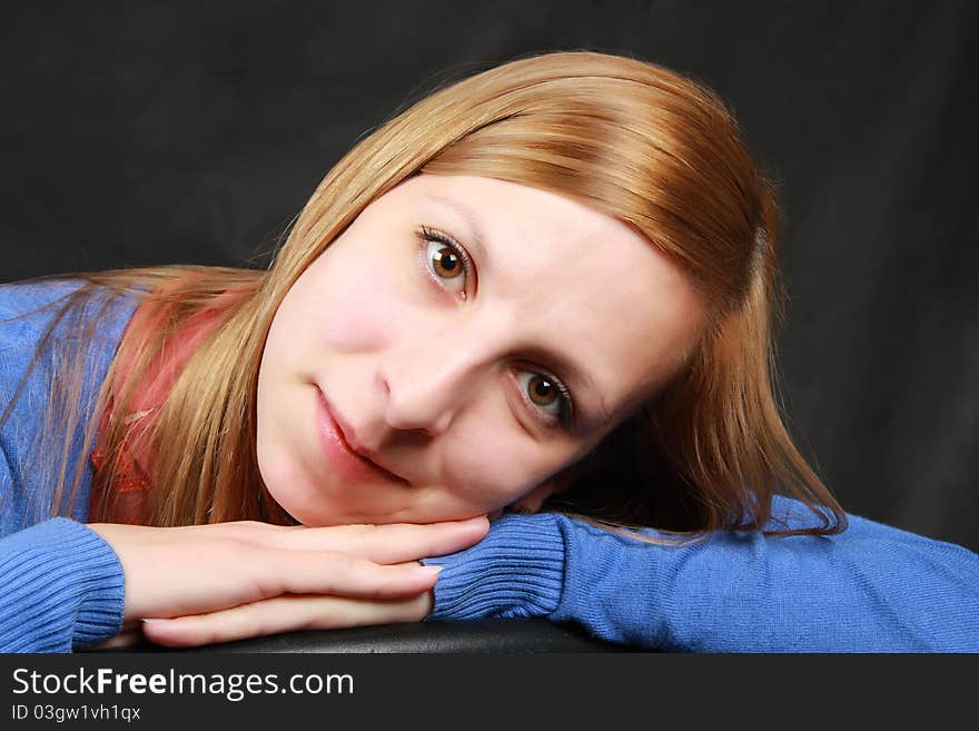 Portrait of the girl on a black background