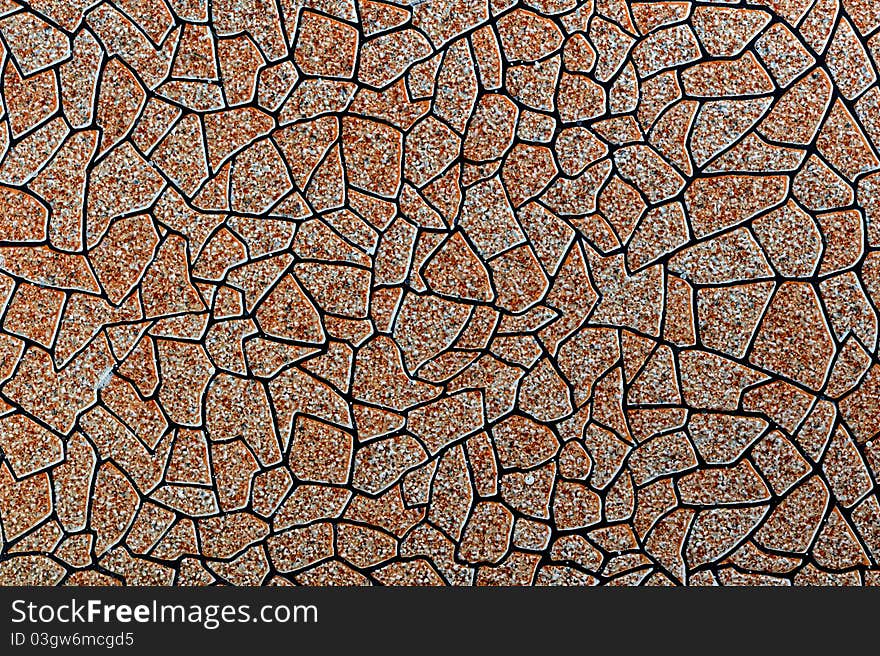 Background of small brown stone tile. Background of small brown stone tile