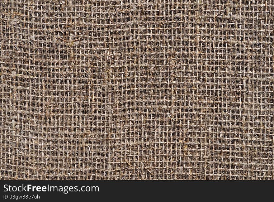 Fragment of rustic sack texture background. Fragment of rustic sack texture background