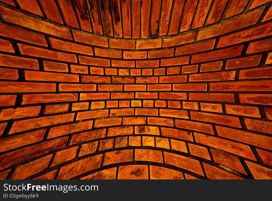 Old orange brick wall pattern texture blast out background. Old orange brick wall pattern texture blast out background