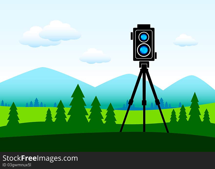 Camera in the green landscape