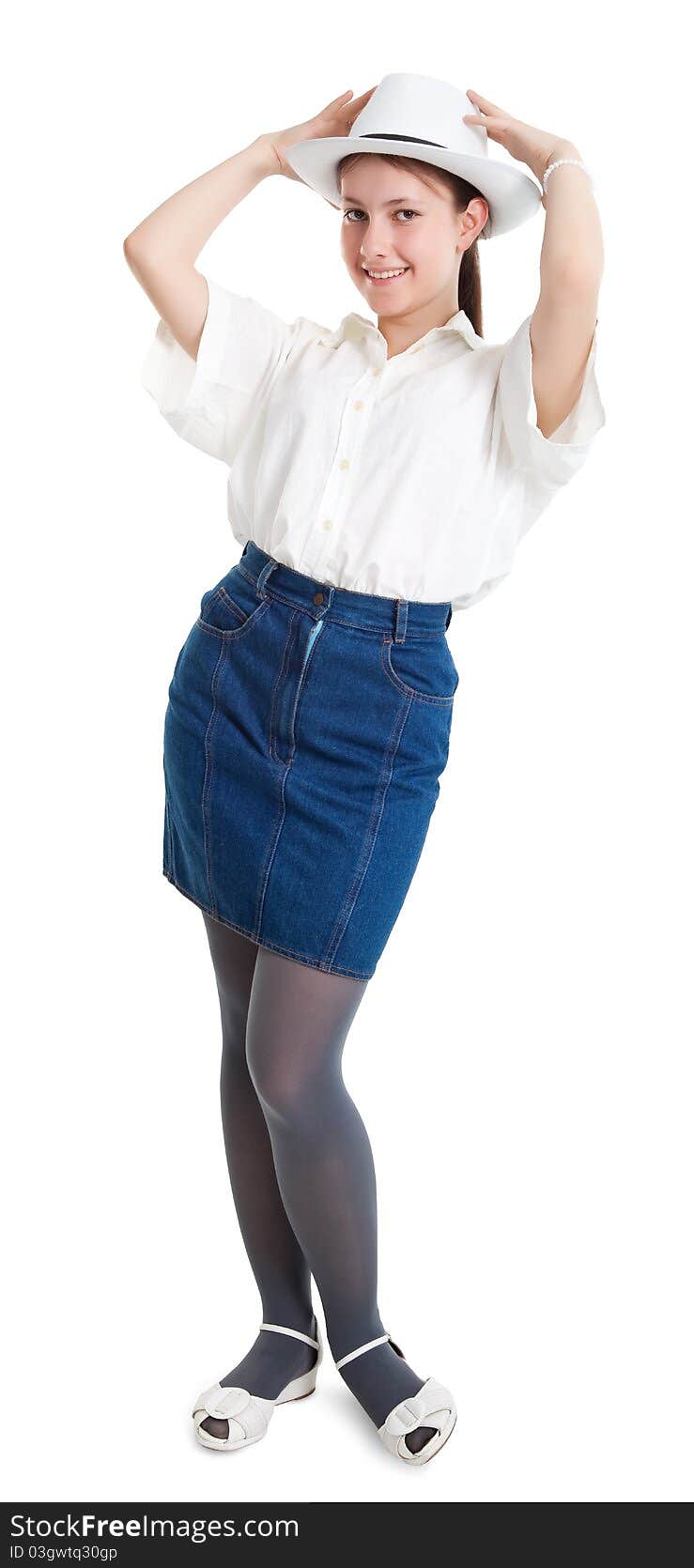 A young girl in a white hat isolated on white background