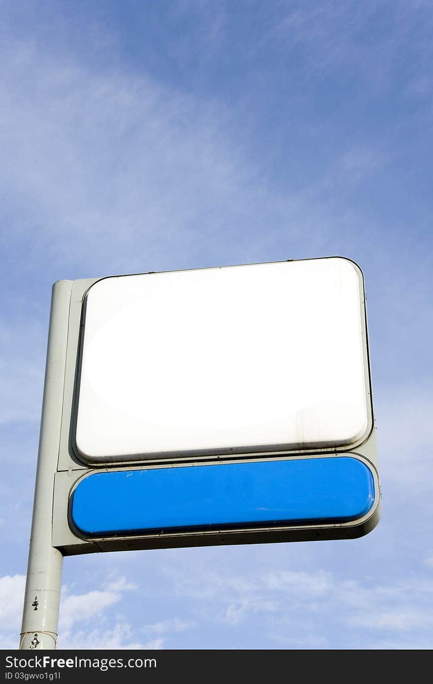 Blank road sign against the sky can be used as abackground