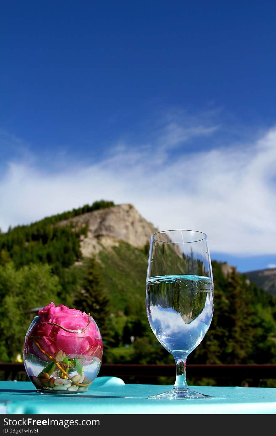 Vail rock formation background through a water glass. Vail rock formation background through a water glass