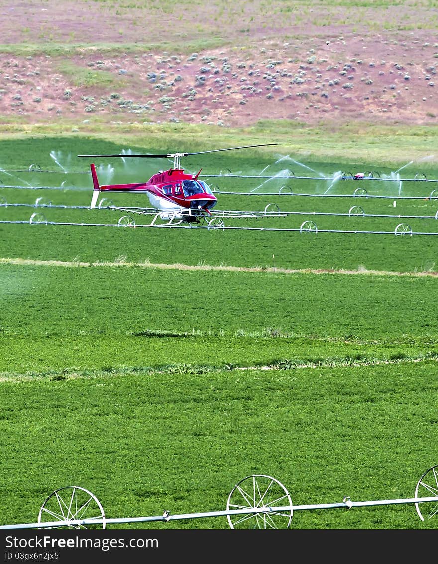 Crop dusting helicopter.