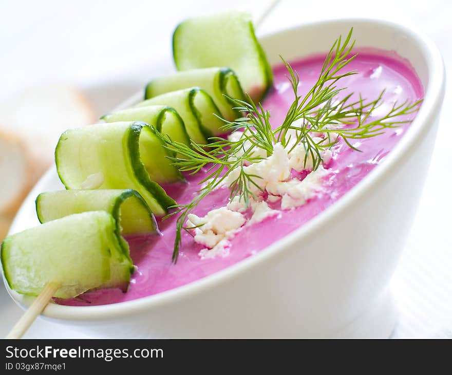 Cold borscht - speciality for hot days. Vegetable cold soup with beetrots. Shallow depth of field, selective focus. Cold borscht - speciality for hot days. Vegetable cold soup with beetrots. Shallow depth of field, selective focus