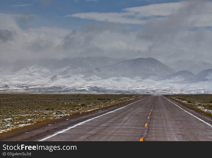 A storm trudges through to the road. A storm trudges through to the road.