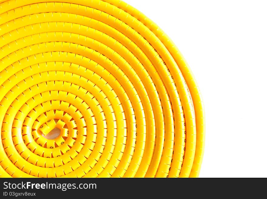 Swirl yellow cable marker isolated on white background