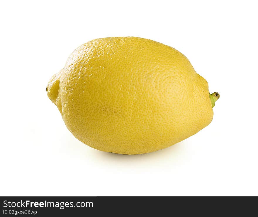 Alone yellow fresh lemon on the white background