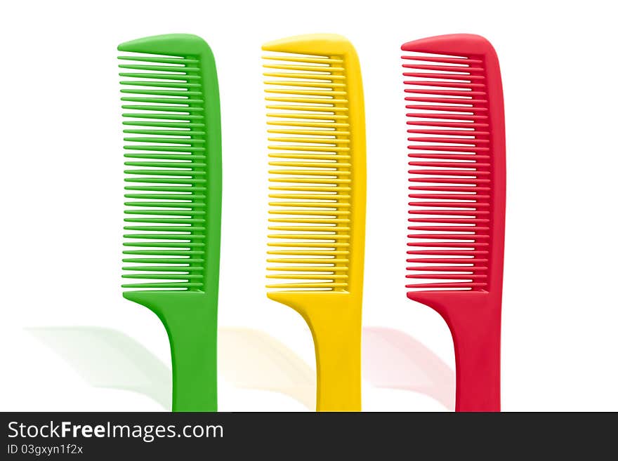 Three combs isolated on a white background. Three combs isolated on a white background