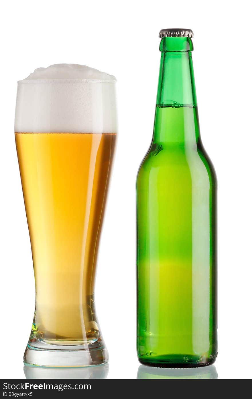 Cup and a bottle of beer on white background. Cup and a bottle of beer on white background