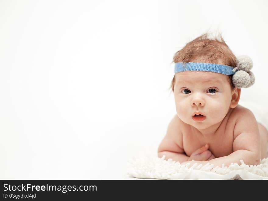 The portrait of a little happy baby. The portrait of a little happy baby