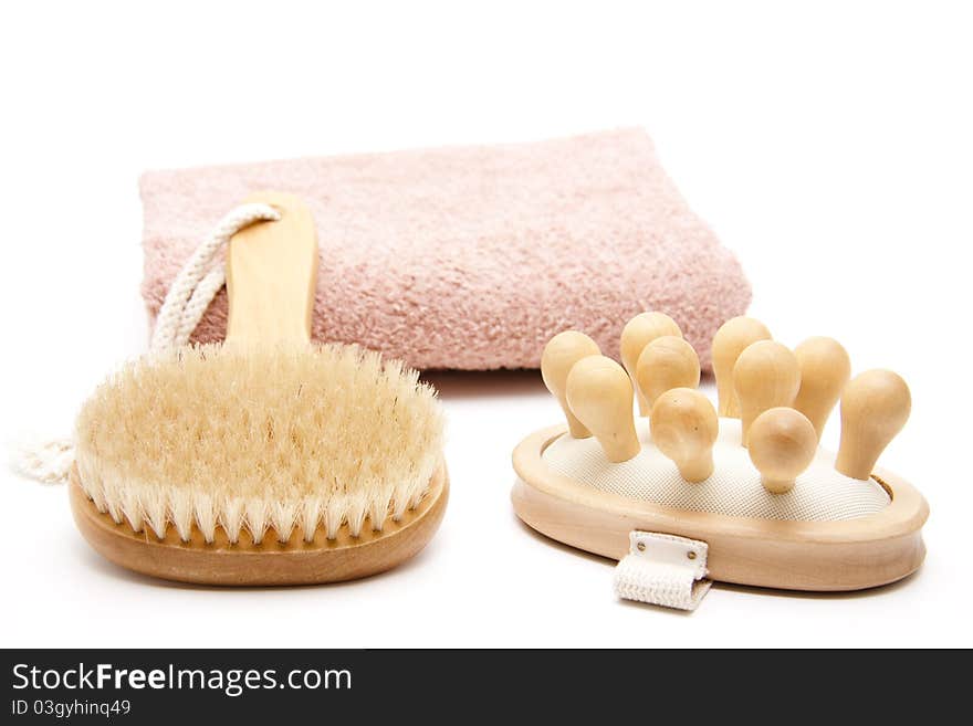 Back brush and massage brush on towel