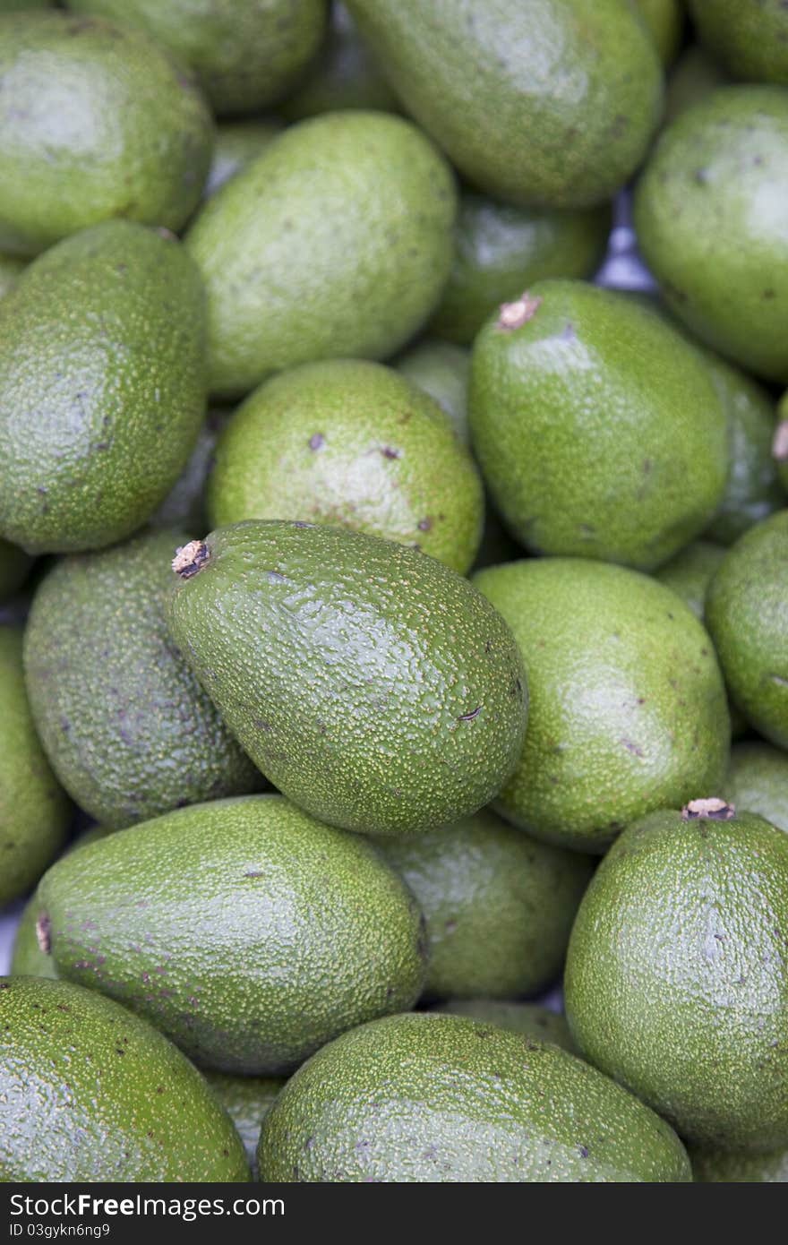 Avocado Background from Market Scene. Avocado Background from Market Scene