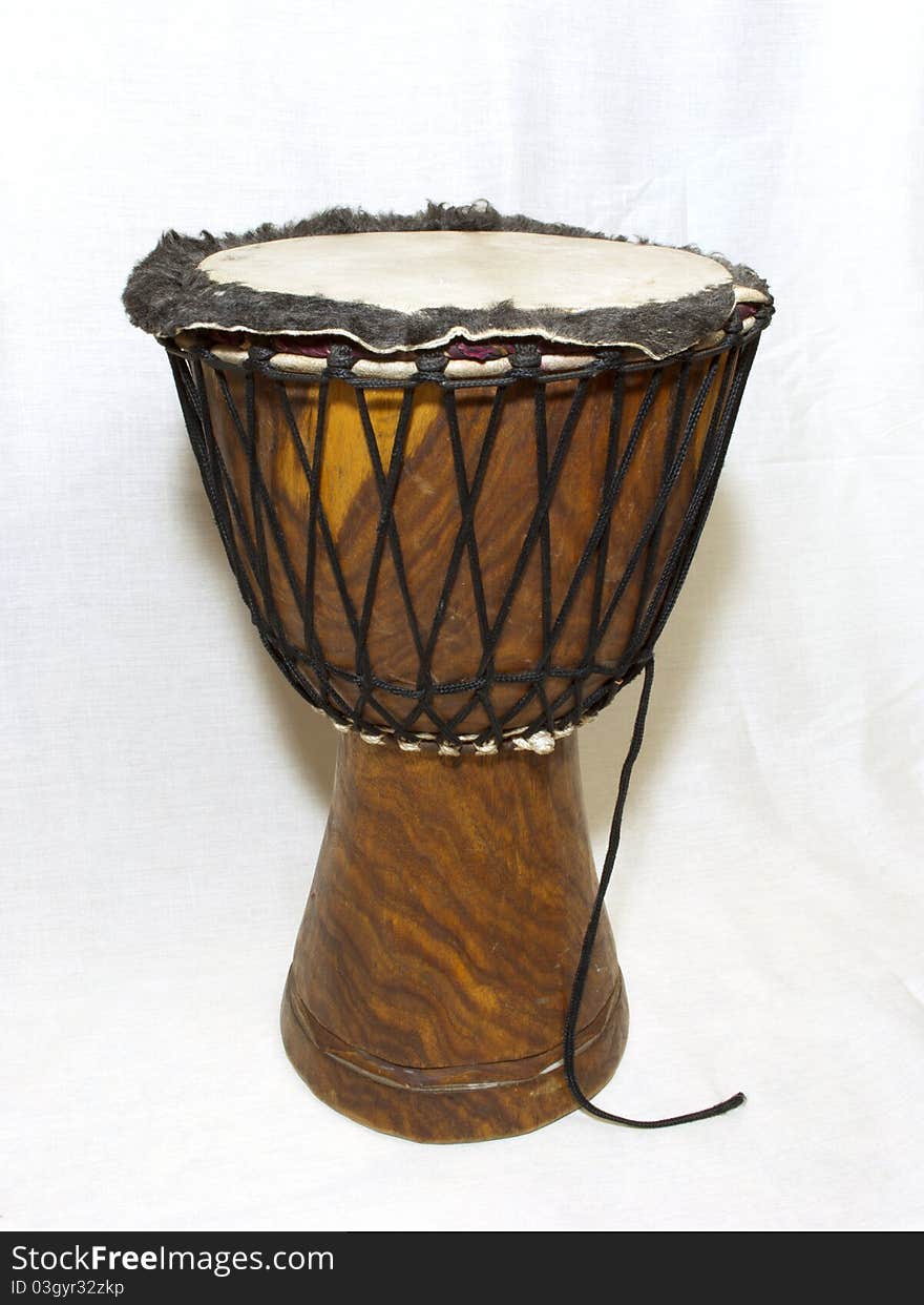 Big djembe drum on the white background.