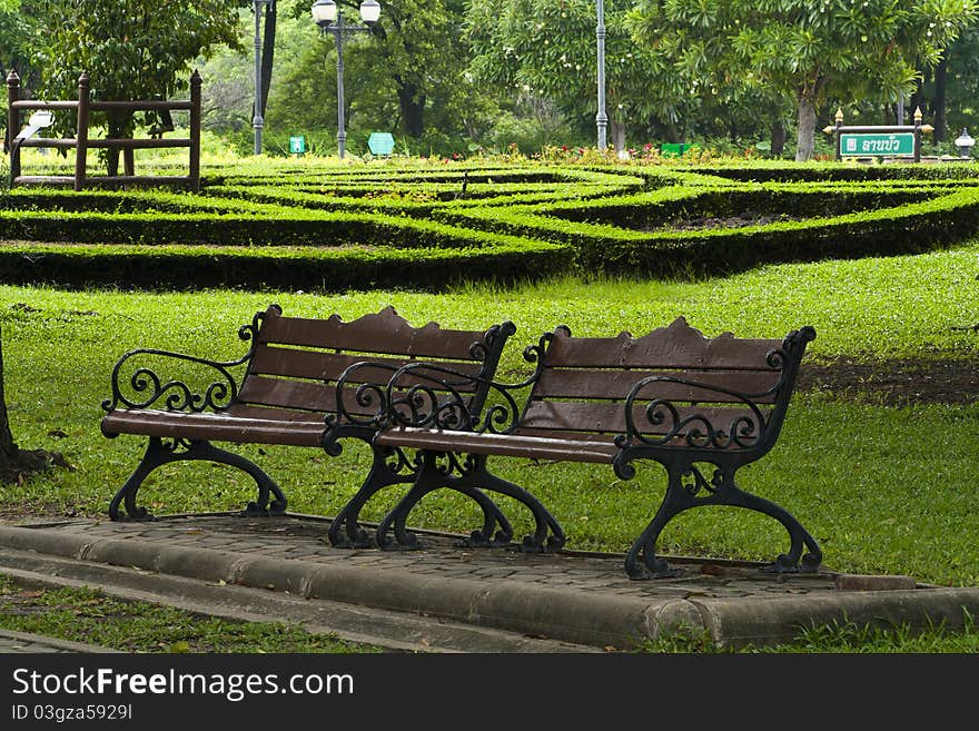 A Couple of benches in the park. A Couple of benches in the park