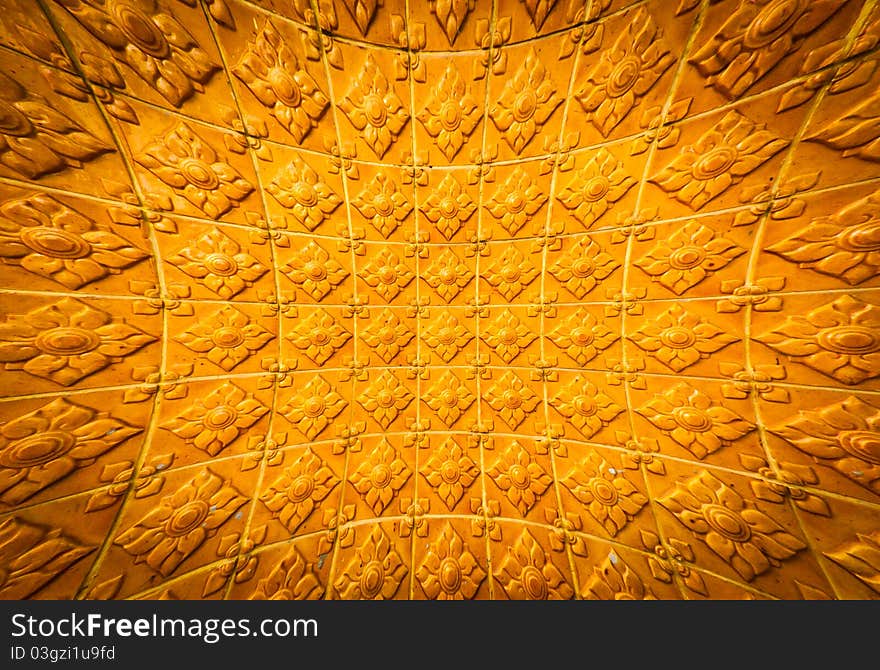 Thai golden temple wall with a flower pattern. Thai golden temple wall with a flower pattern