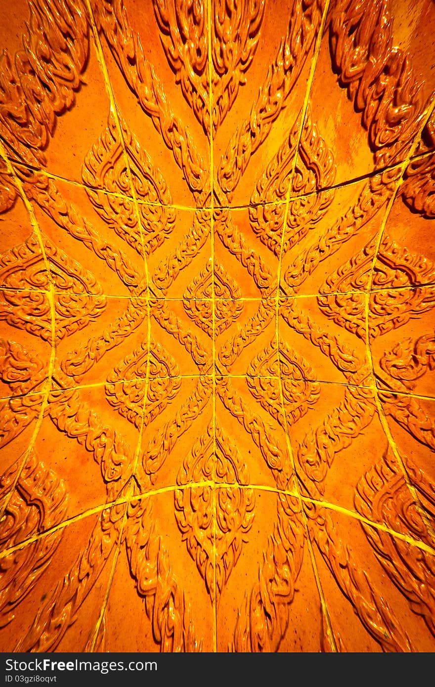 Thai golden temple wall with a flower pattern. Thai golden temple wall with a flower pattern