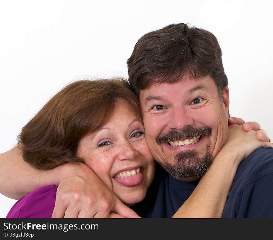 Man And Wife Enthusiastically Hugging Each Other