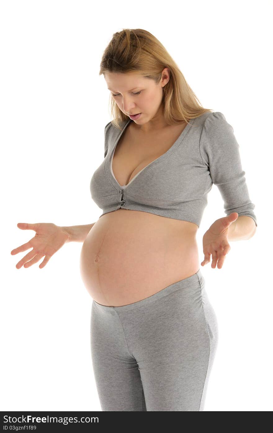 Astonished Pregnant Woman In Gray Suit