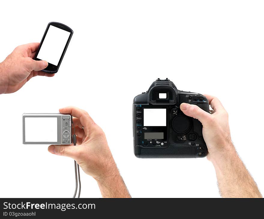 Digital cameras hand held isolated against a white background. Digital cameras hand held isolated against a white background