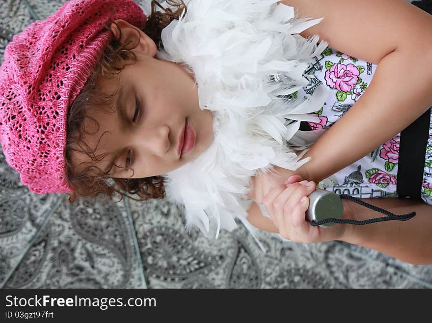 Girl child dressed like a French girl carrying an umbrella. Girl child dressed like a French girl carrying an umbrella