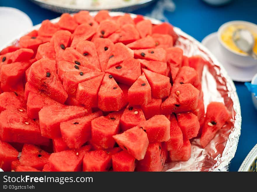 Red watermelon on dish