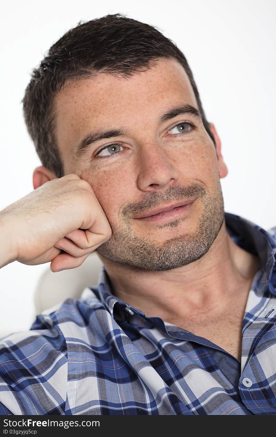 Beautiful man relax on sofa at home. Beautiful man relax on sofa at home