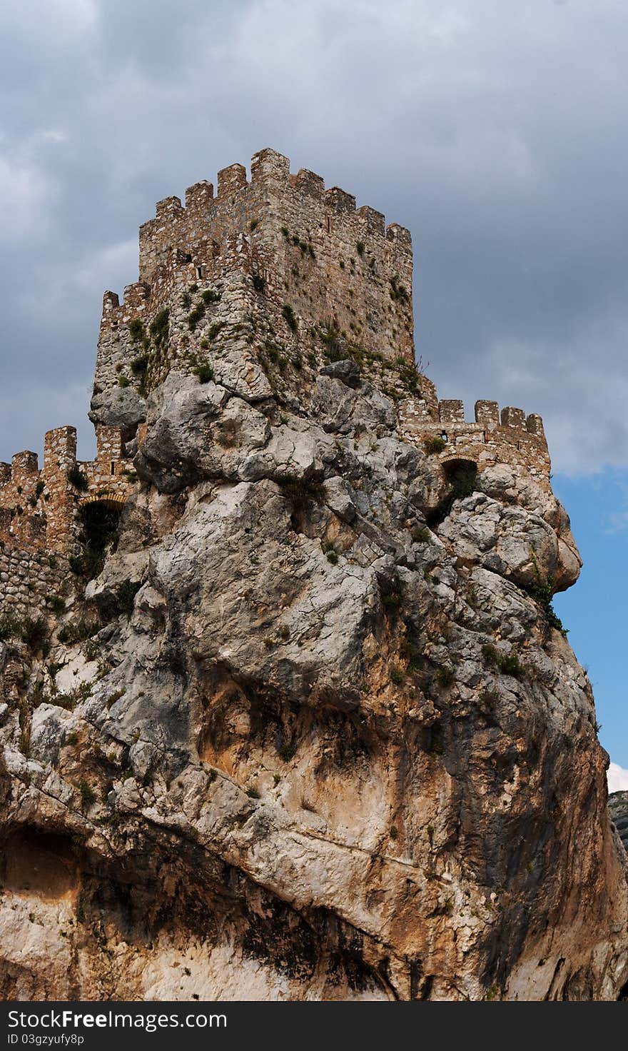 Ruins of a medieval castle on the rock in Zuheros village in Spain