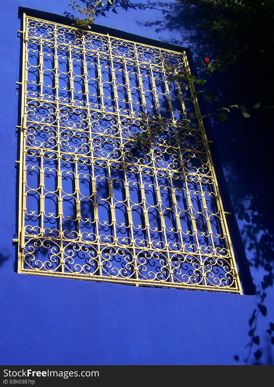 Ornamental decorated window in the garden of majorelle, marrakech. Ornamental decorated window in the garden of majorelle, marrakech