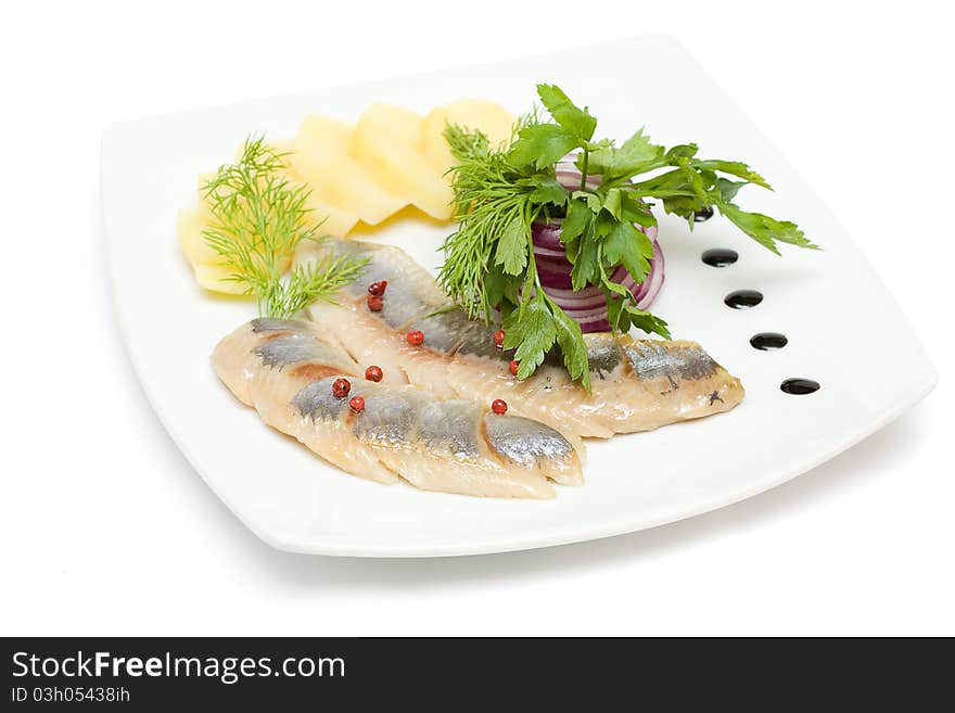 Herring appetizer isolated on white