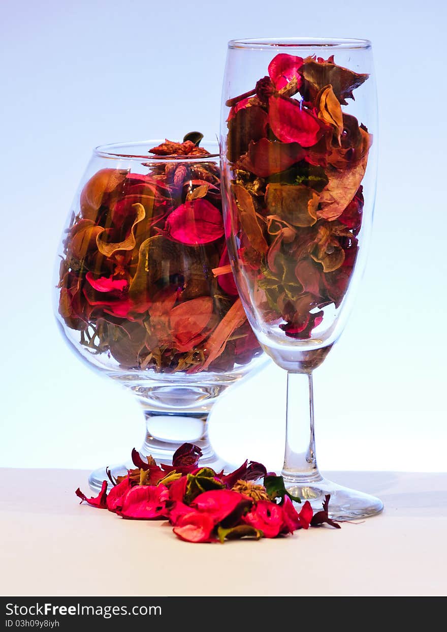 Glass with dried leaves