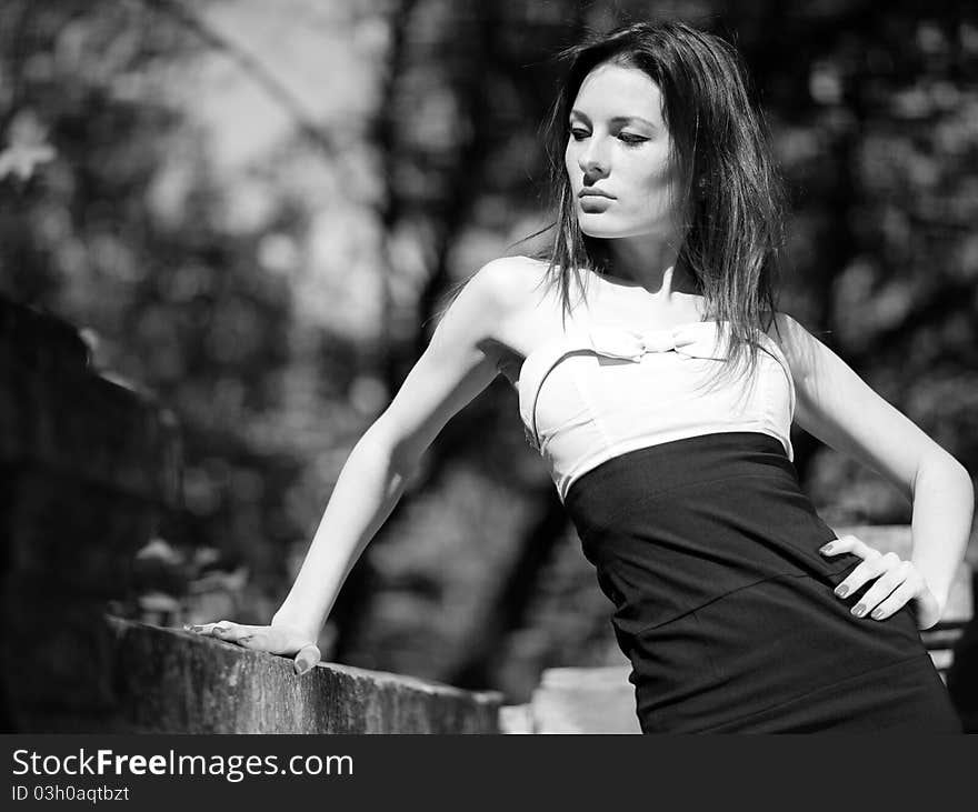 Young pretty woman portrait. black and white film stylization