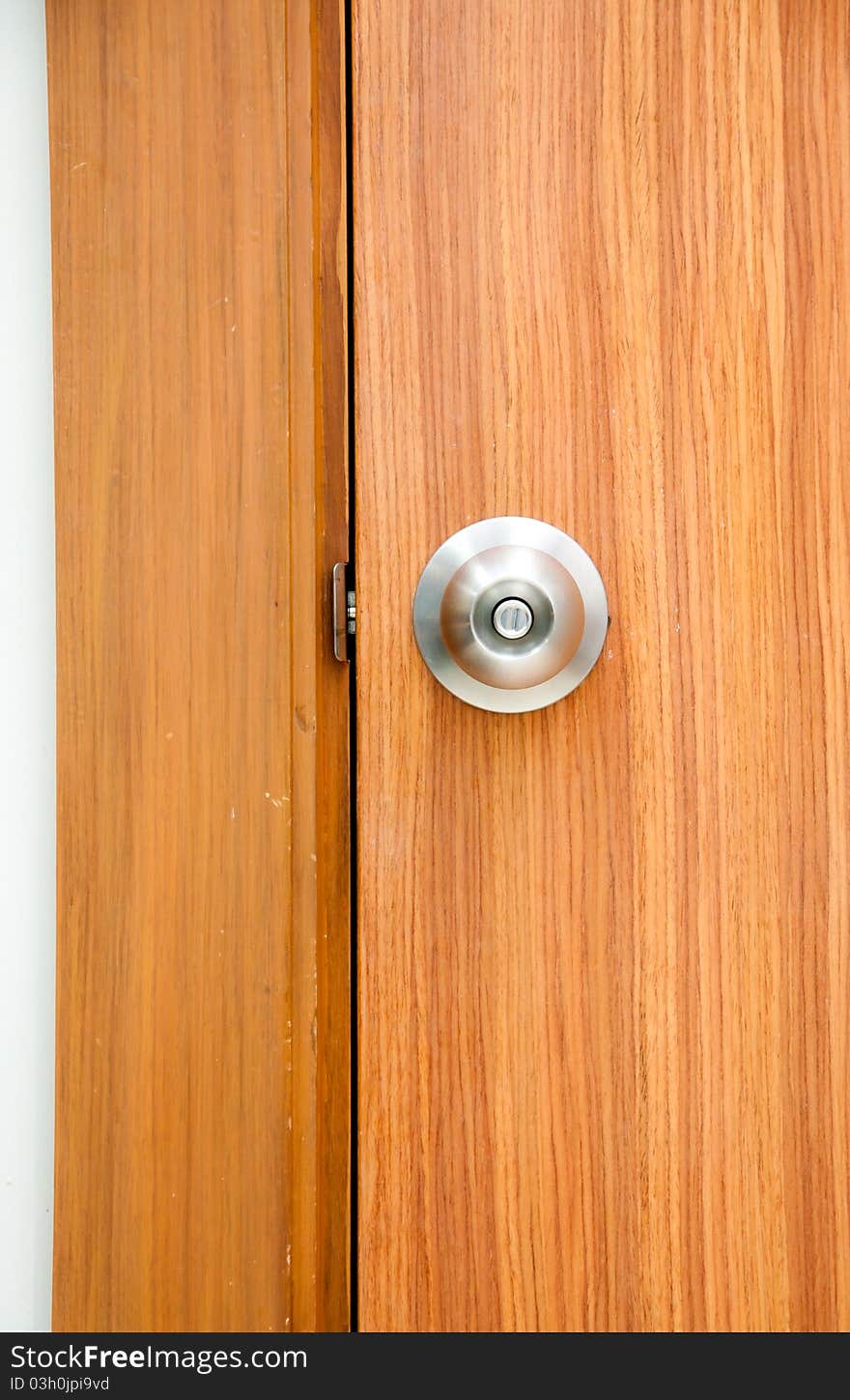 Door knob on wooden door