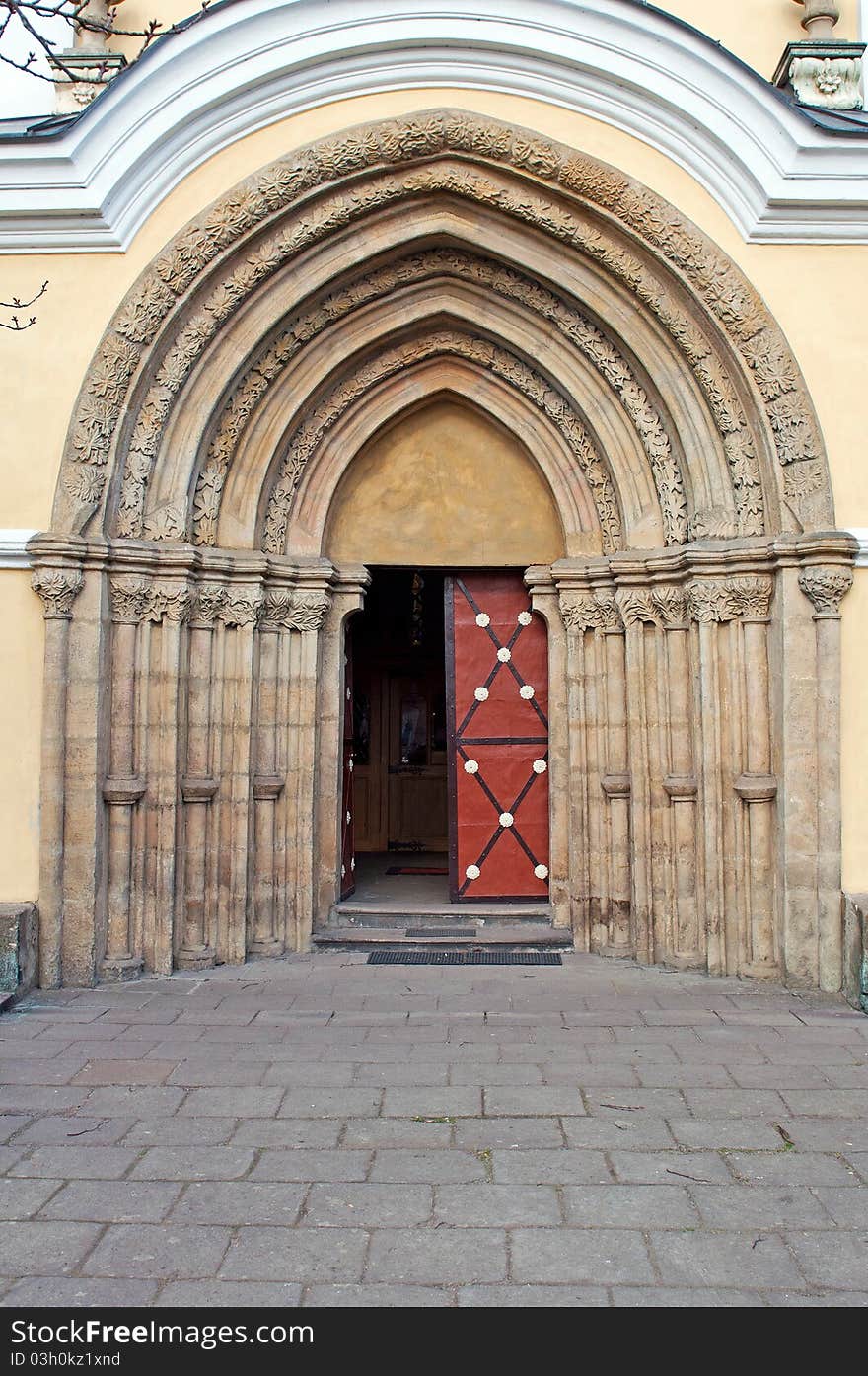 Castle door during the daytime, vertical shot.