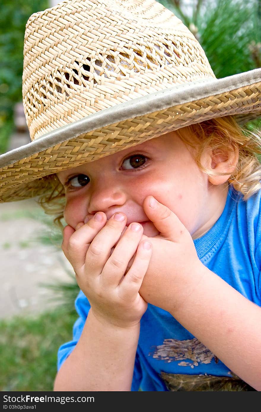 Little Boy In  Big Hat