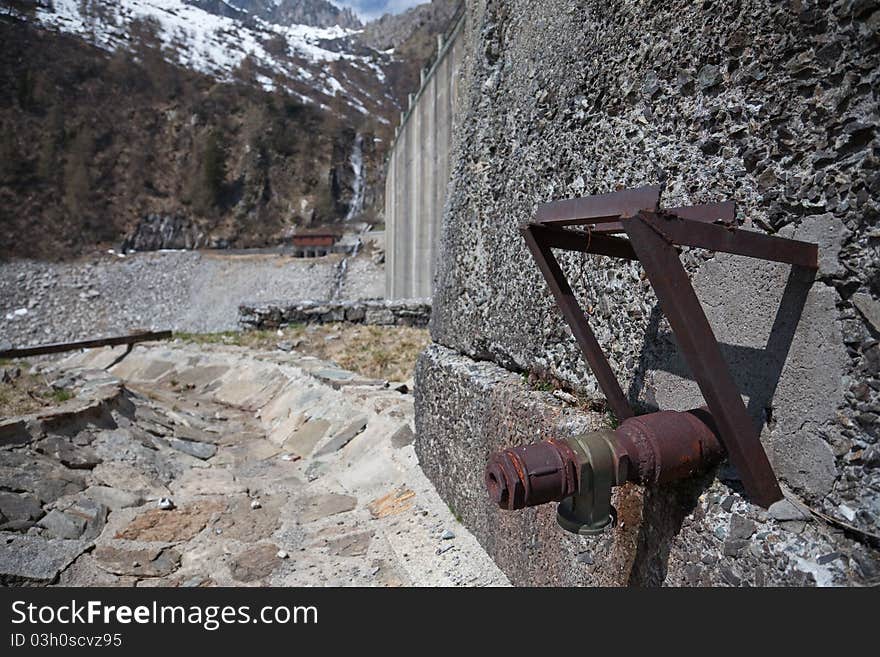 Dam at the end of Arno man-made lake basin at 1900 meters on the sea-level. Brixia province, Lombardy region, Italy