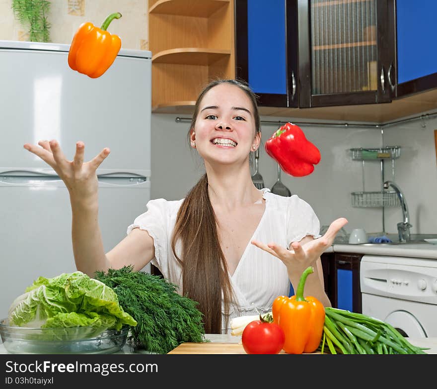 Young Beautiful Caucasian Woman In The Kitchen