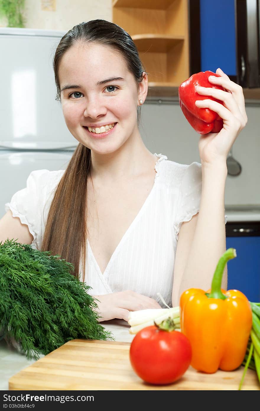 Young Beautiful Caucasian Woman In The Kitchen