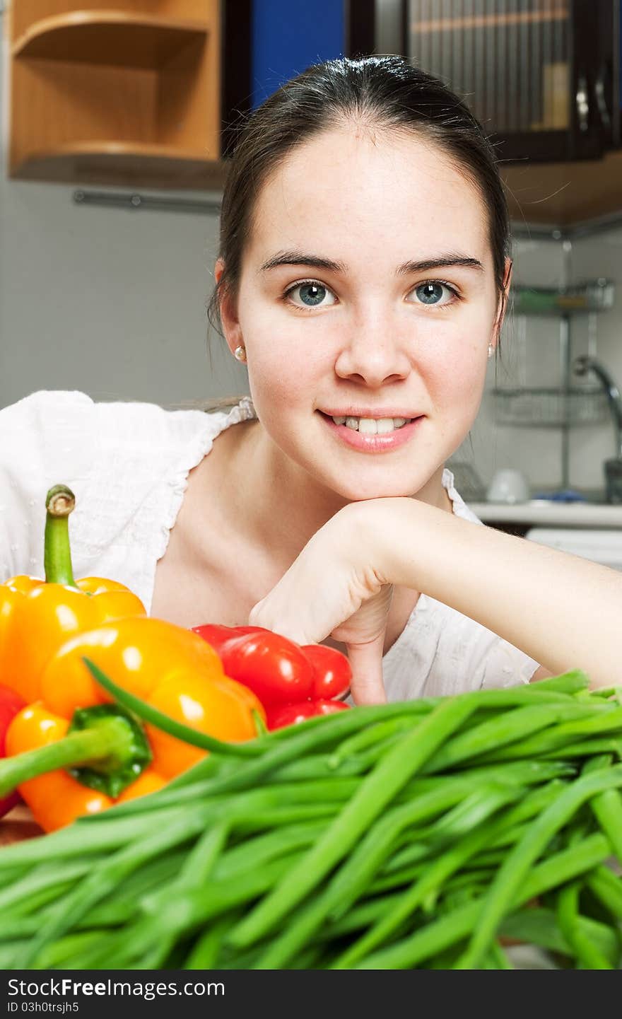 Young Beautiful Caucasian Woman In The Kitchen