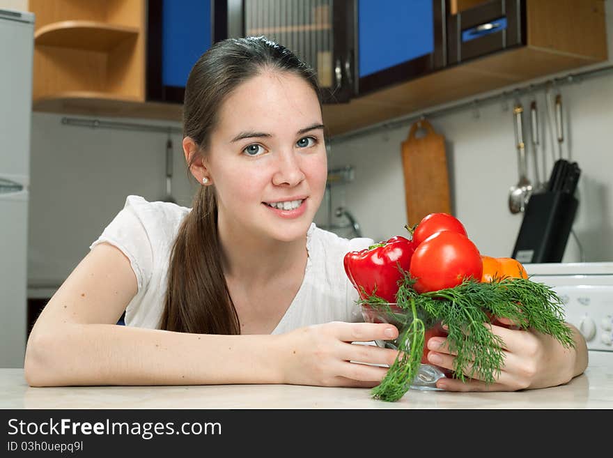 Young Beautiful Caucasian Woman In The Kitchen